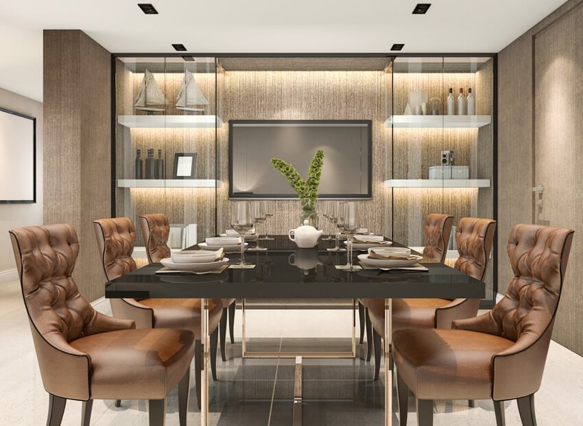 Floor to ceiling glass shelving with leather dining chairs and ceramic top table