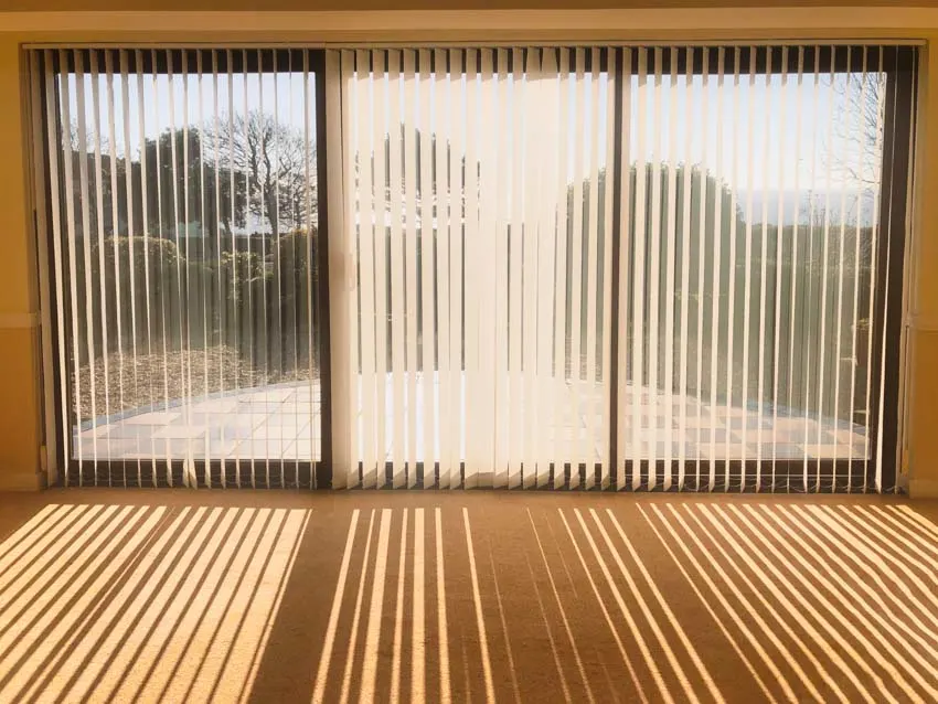 Wide doors covered with attached blinds