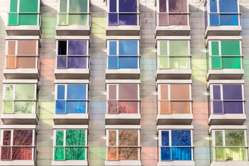 Facade with colored window tints in a building