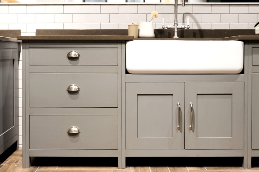 A grey pre assembled inset shaker cabinets with luxury bespoke kitchen sink