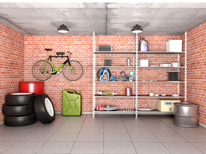 Clean garage interior with tools equipment and wheels