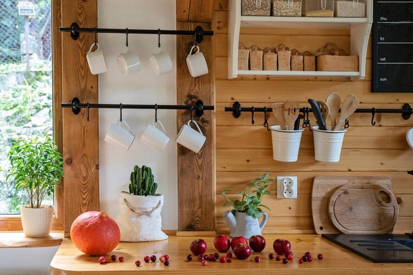 Kitchen with rustic vibe and wood planks as backsplash