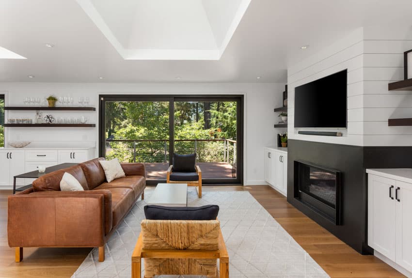 Living room with shiplap bar backsplash and couch