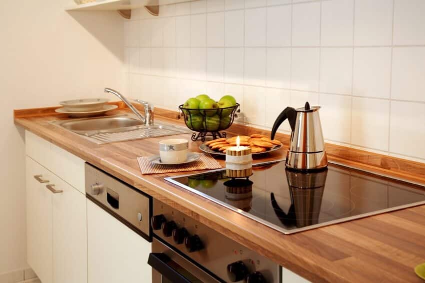 A new kitchen with ceramic wood tile countertop