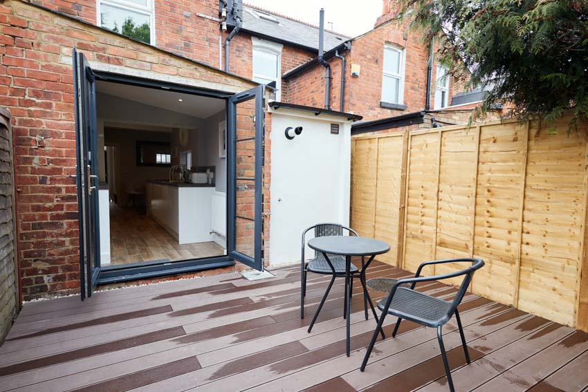 Hinged-type door for the patio leading to a wood deck