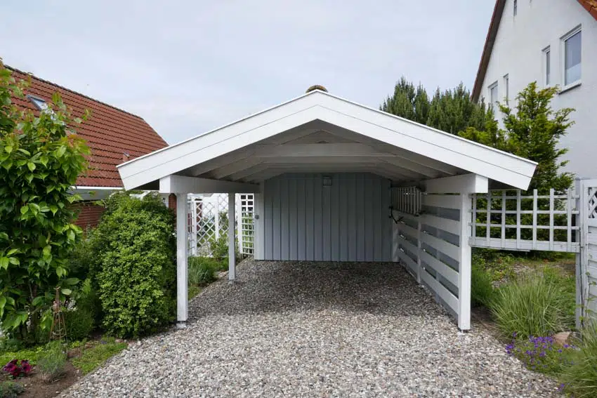 Residential property with carport, and crushed rock driveway