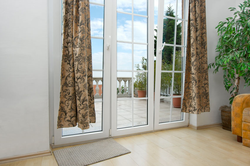 Interior of a room with brocade curtains