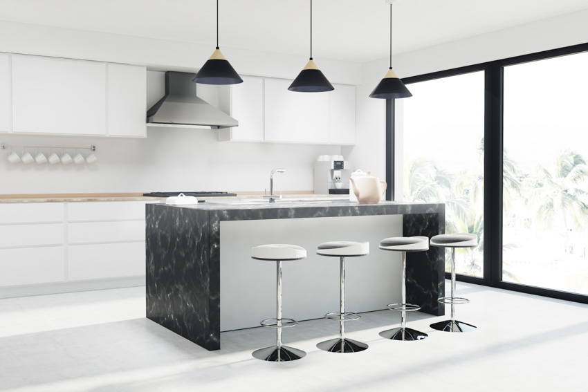 Swiveling stools with black, white and silver design