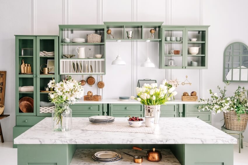 Kitchen with calacatta extra marble and green cabinets