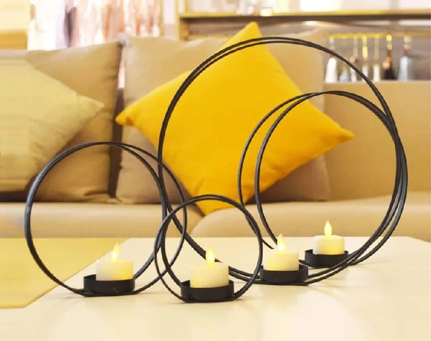 Tealight candles on metal ring shape candle holder