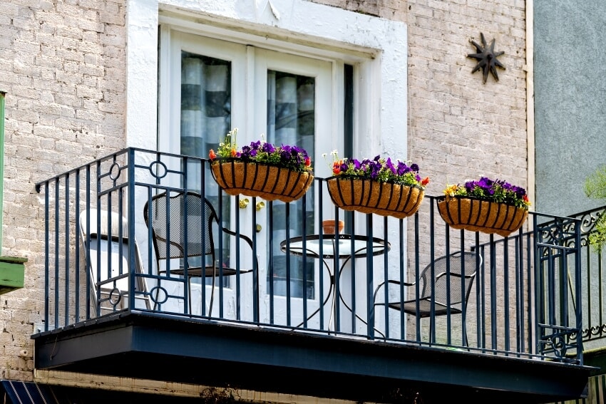 A vintage architecture apartment with plants in cast iron faux balcony