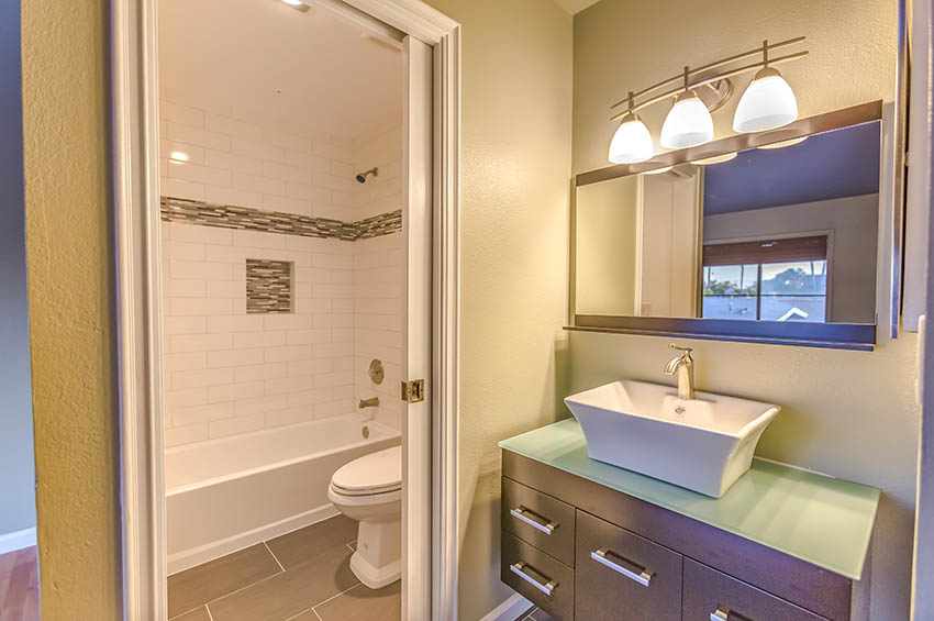 Bathroom with vessel sink and floating vanity