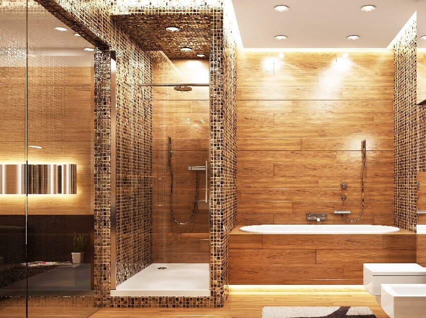 A bright bathroom with wooden walls and floors, bathtub, toilet and shower tiled walls and ceiling