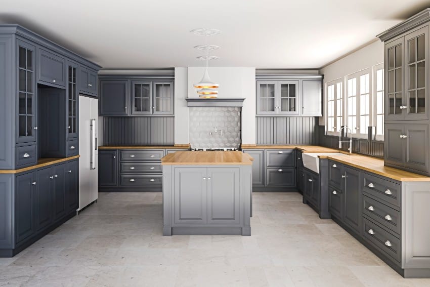 Kitchen with grey cabinets, wooden countertops and white ceiling