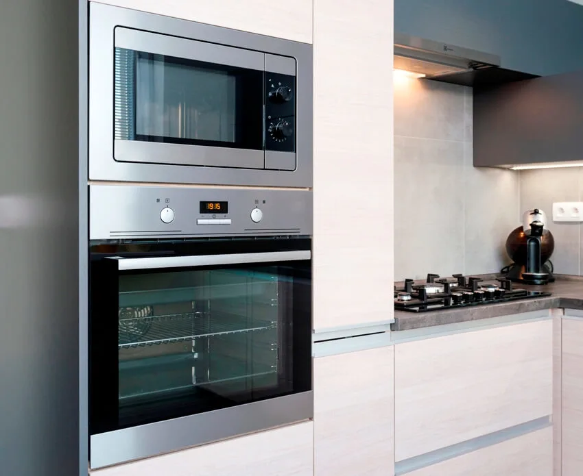 A clean interior with microwave and integrated oven