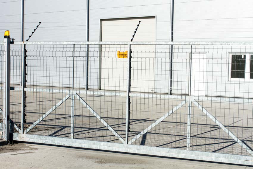Electric fence gate to protect residential and commercial properties