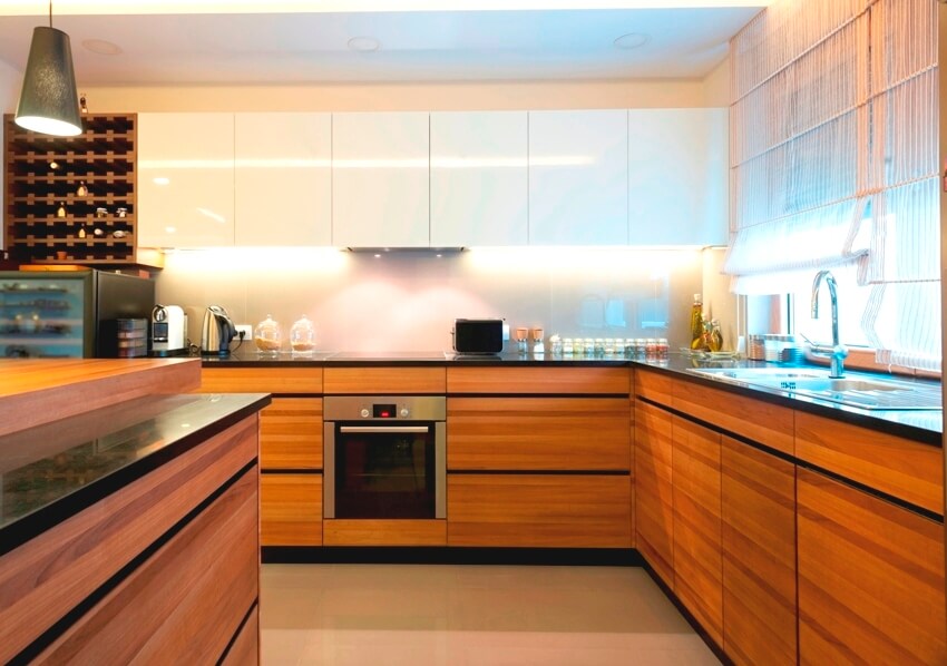 Kitchen with melamine cabinets and drawers and white backsplash