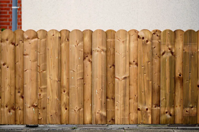 Image of overlapping fence made of sturdy wood