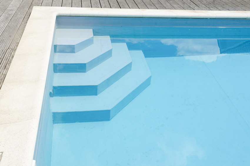Image of swimming pool steps, and pool plaster