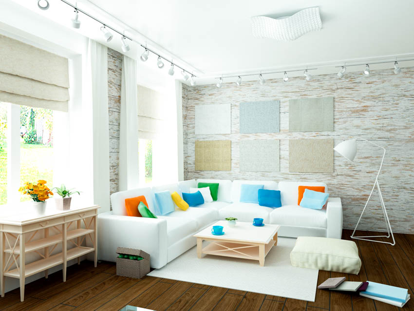 Room with textured shades, colorful pillows with floor cushion