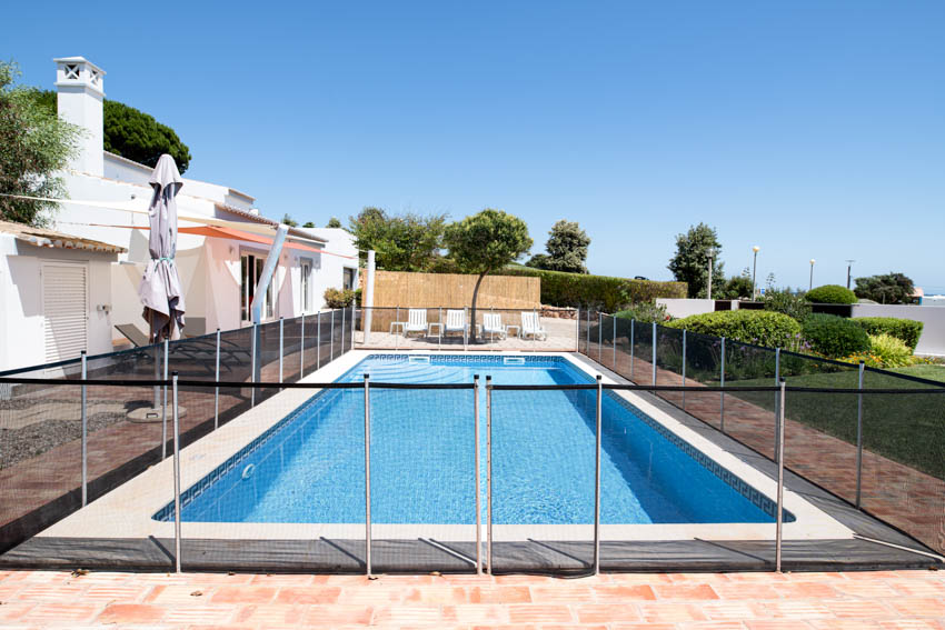 Swimming pool, deck, and pool fence