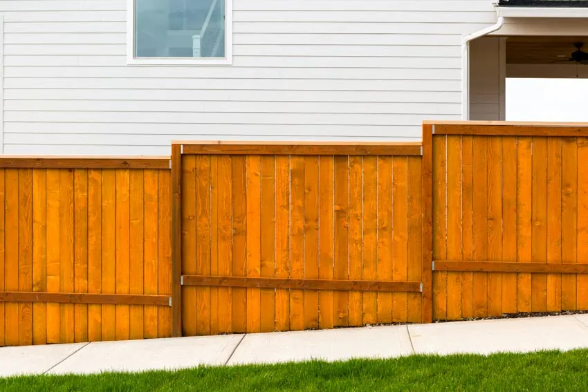 Privacy side by side fence on a sloping street