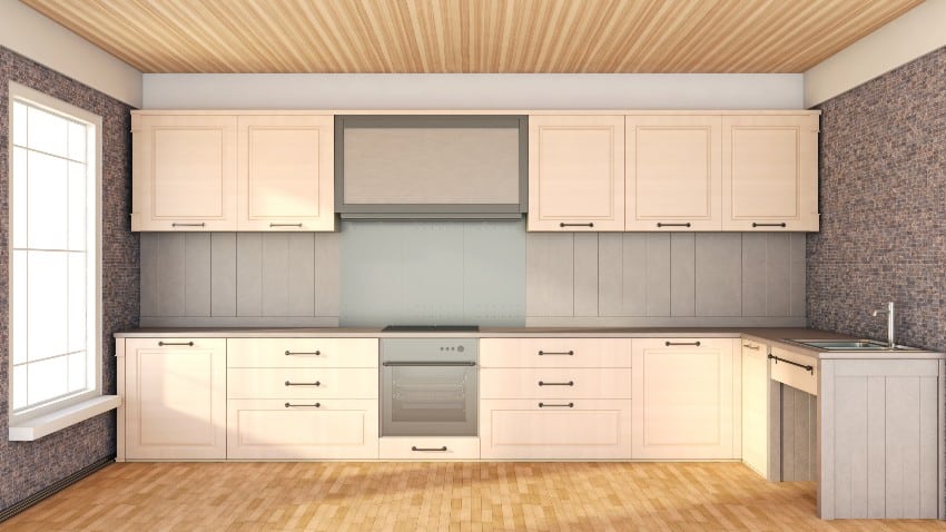Kitchen with faux shiplap, beadboard with ceiling and cabinets with handles