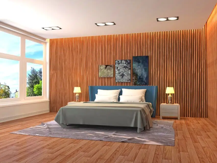 Stunning bedroom interior with bamboo wall panels, bedside lamps on tables, and bed with pillows