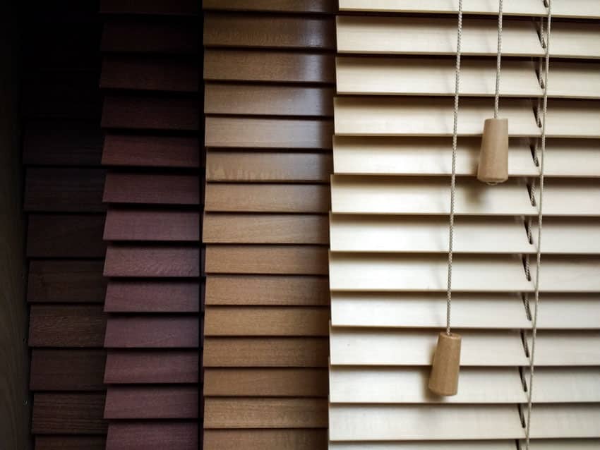 Variety of faux wood type window blinds 