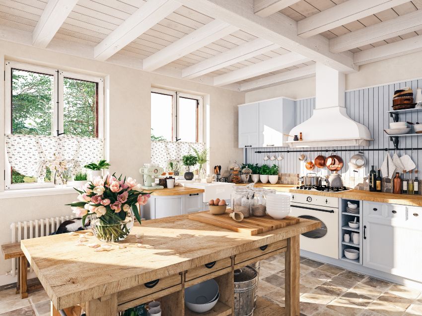 White kitchen with wooden island, vertical shiplap backsplash and other accessories