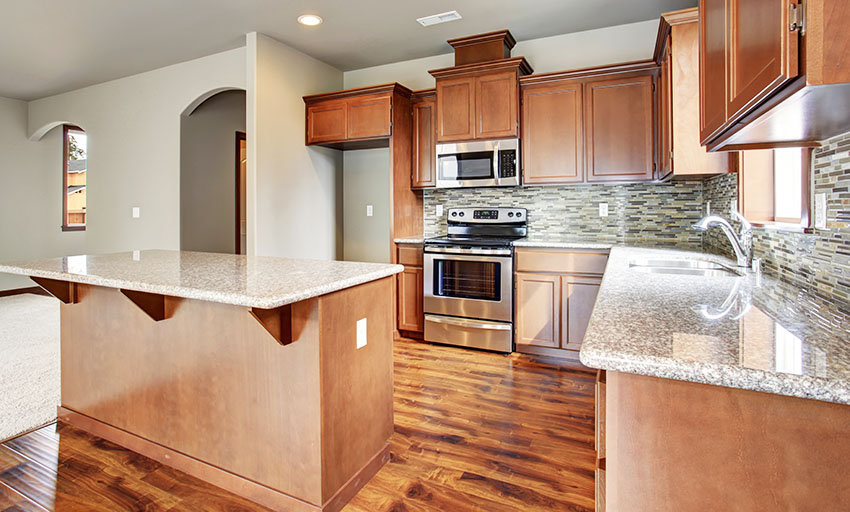 Kitchen with laminate countertops that look like granite
