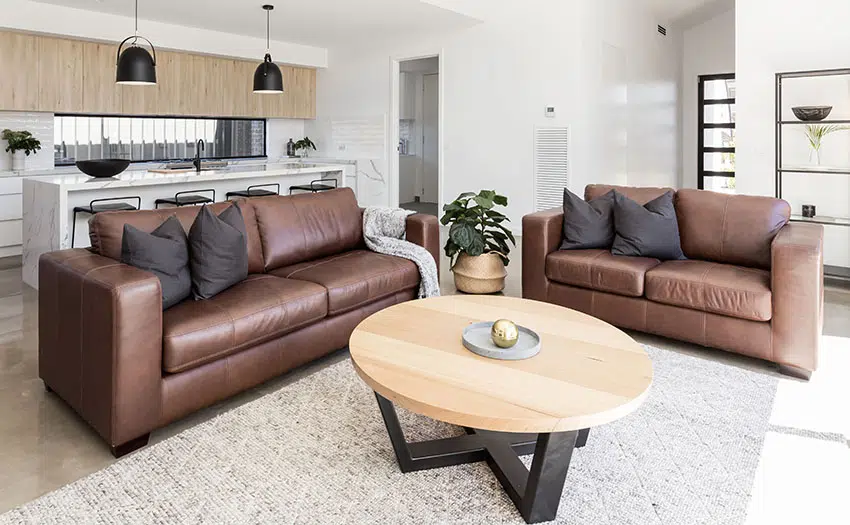Room with leather sofa and round center table 