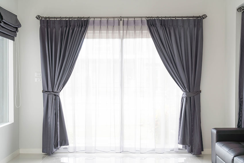 Living room picture window black curtain