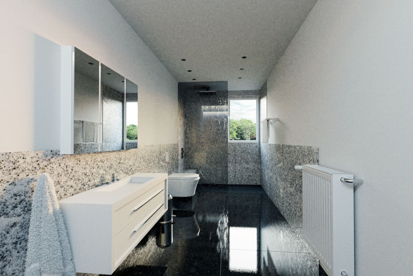 Bathroom granite wall, high gloss tile surface, floating vanity and toilet