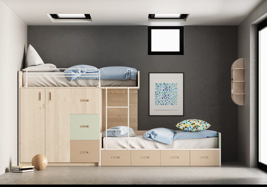 Bedroom with gray wall, bunk bed, cabinets, pillows, mattresses, and window