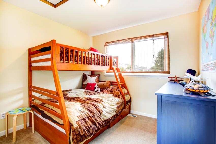 Bedroom with windows, blue dresser table, stool, bunk bed, mattress and pillow