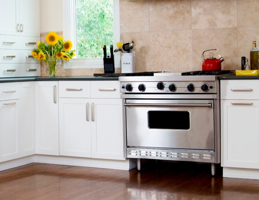 Classic kitchen interior with freestanding stove and oven