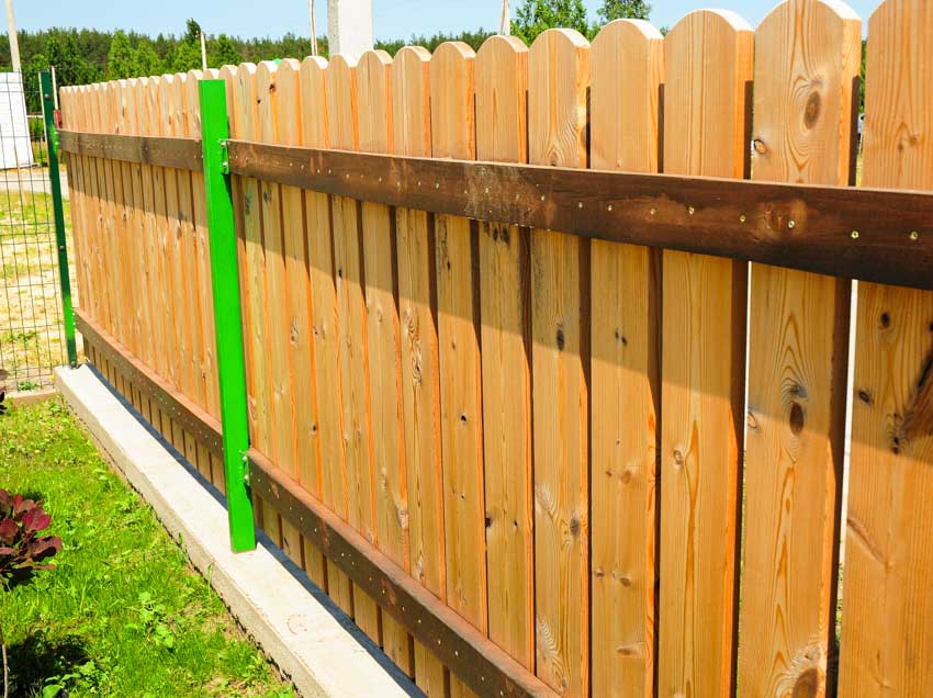 Closeup image of residential cedar wood fences