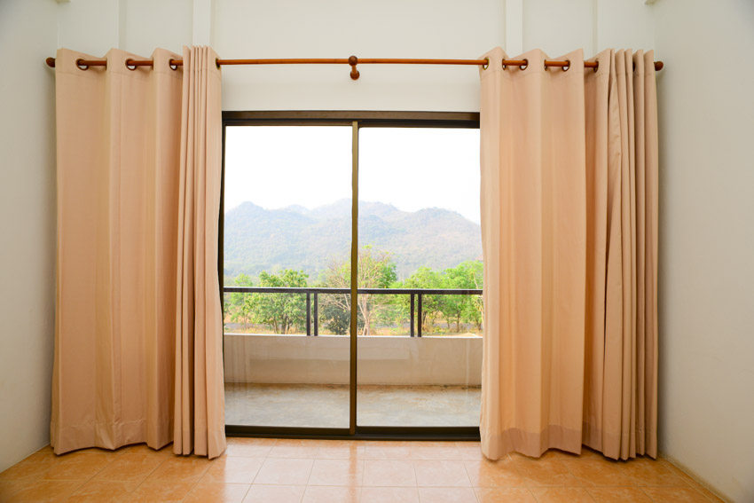 Room with rayon curtain and sliding door
