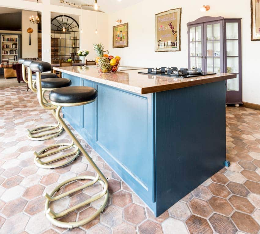 Brass counter chairs, granite countertop with blue base