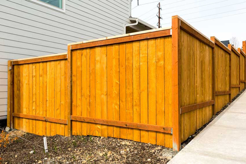 House exterior with siding, and Chinese cedar fence