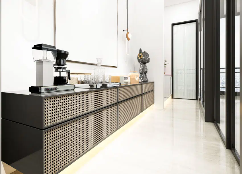 Built-in coffee bar, porcelain floor, and different kitchenware