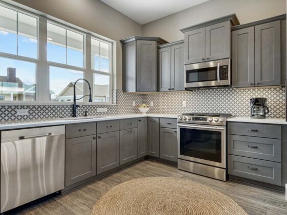 Kitchen With Tile Backsplash Oven Range Hood Window And Mdf Cabinets Is 561x421 