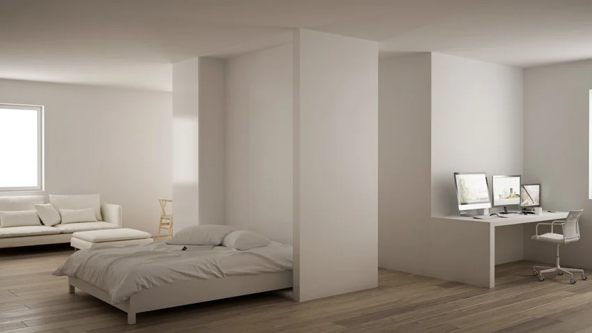 Minimalist interior space with murphy bed, home office area, couch, white walls, wood floors, and window