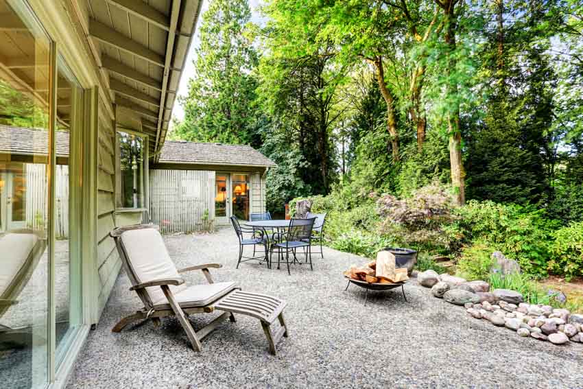 Alpine backyard lounge with loose stones