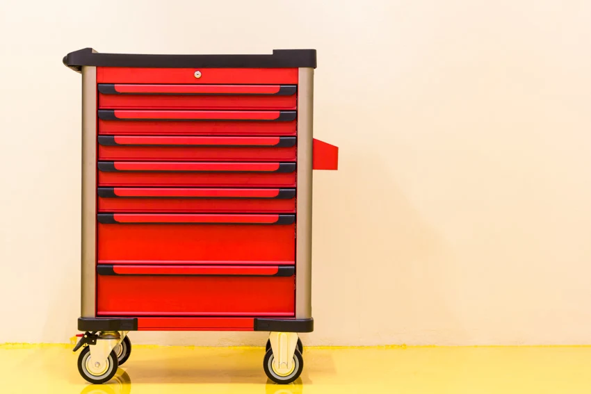 Red tool chest as creative nightstand alternative
