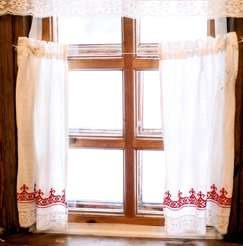 Tier curtain on a window for home interiors