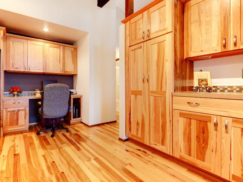 Wooden kitchen interior with built-in desk