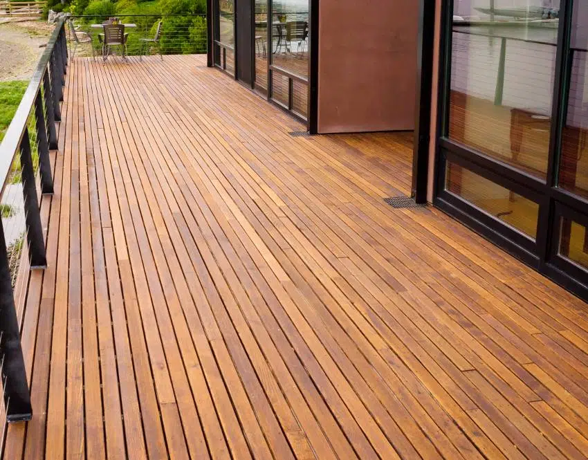 A beautiful waterfront home with back teak wood decking