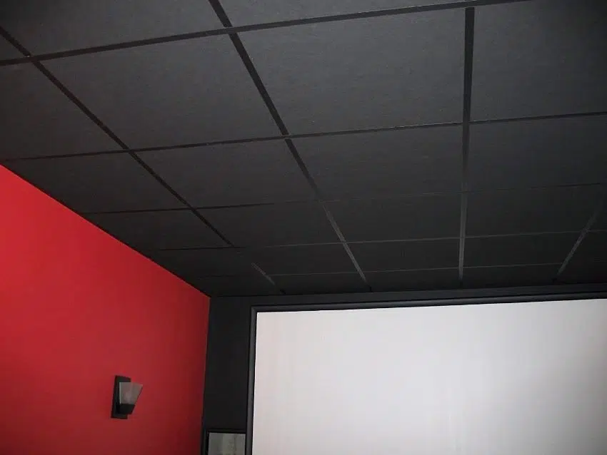 Black acoustic tiles and red wall